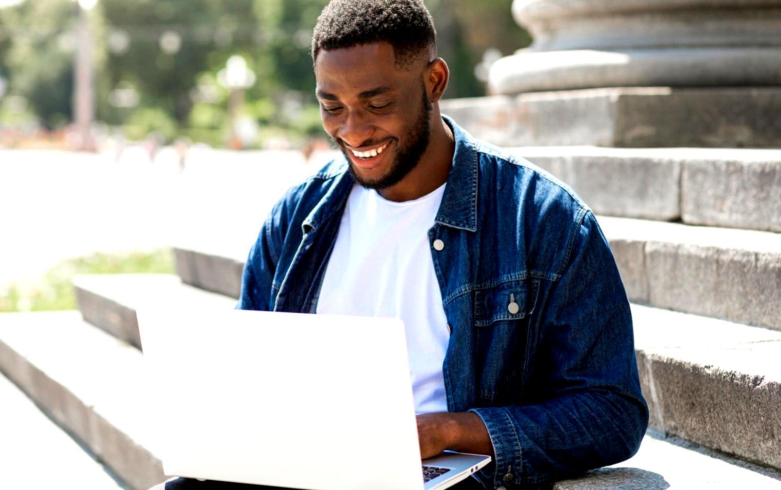 Financial charts and graphs displayed on multiple monitors