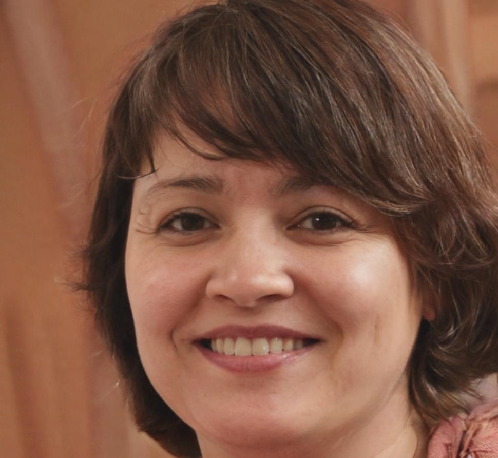 Professional headshot of Maria Rodriguez